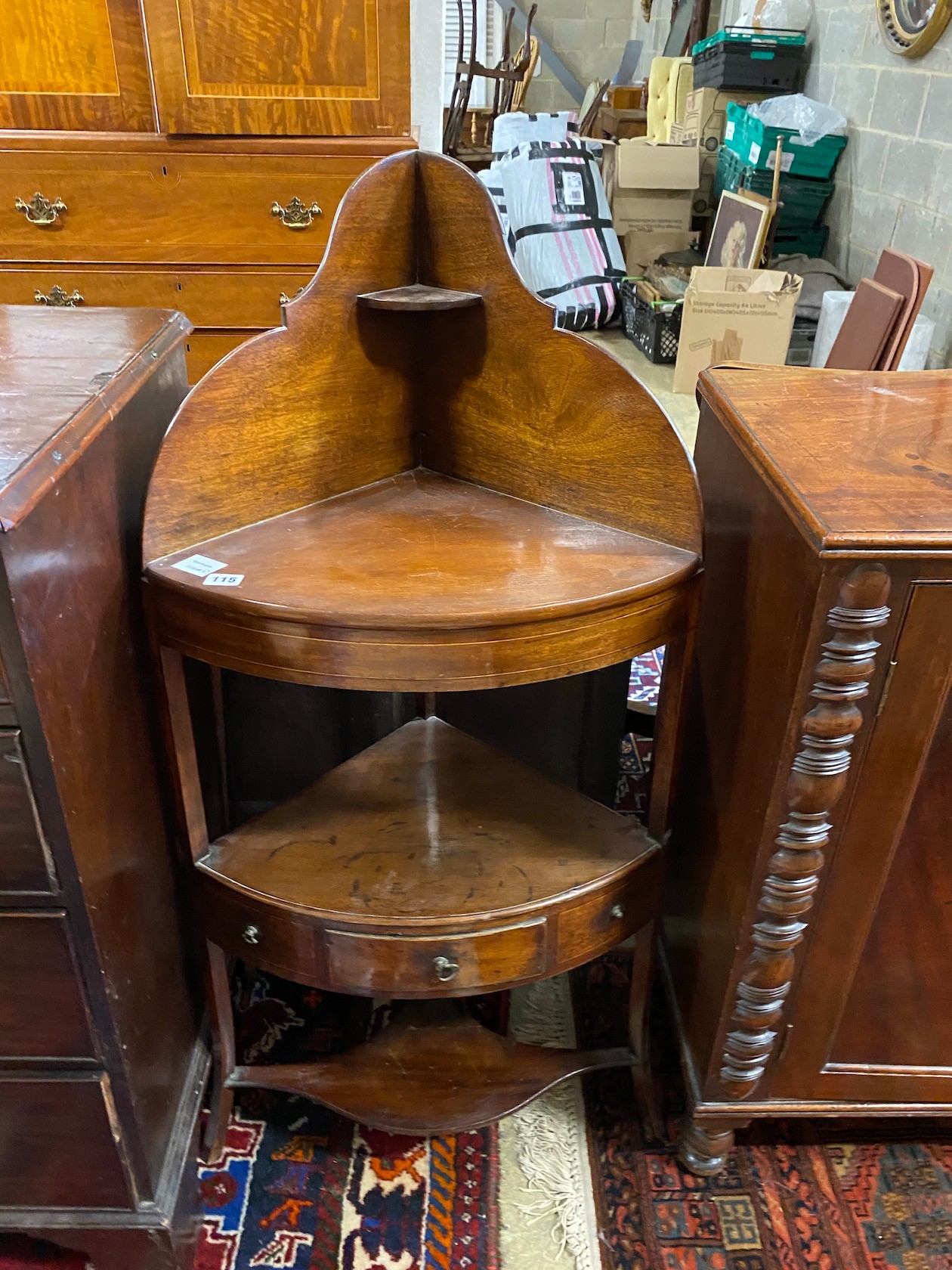 A George III inlaid mahogany bowfronted corner washstand, width 54cm, depth 38cm, height 116cm